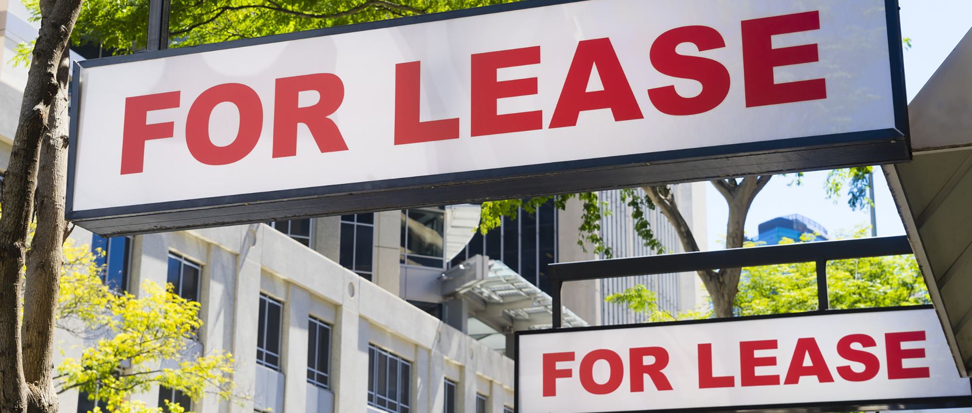 For Lease signs on display outside buildings MRE Property Management, LLC